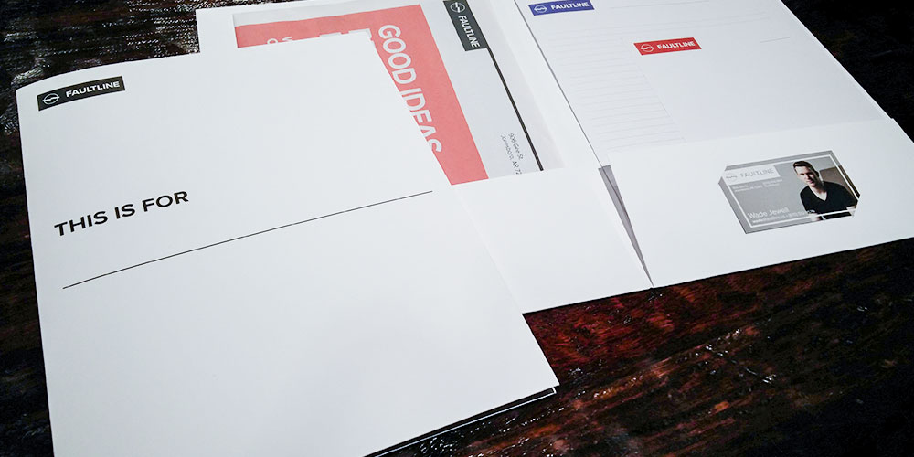 a cardstock folder with all of the collateral material inside